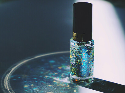 Rows of colorful nail polish reflect shifts in spending habits, self-care, and affordable indulgences during economic downturns