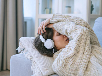 As tears slip down her cheeks, the music becomes a balm for her soul, offering a connection to emotions that run deep