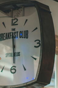 A large clock with the word ''Breakfast'' on it 