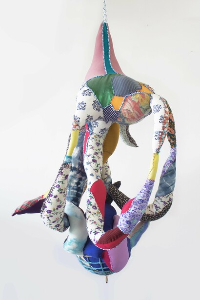 Hanna Washburn, Embrace (2024), Recycled Textiles, Thread, Batting, Welded Steel, Found Objects, Polymer Clay, Rope, Snap Hook, 48 x 32 x 20 inches. Courtesy of the artist and Susan Eley Fine Art