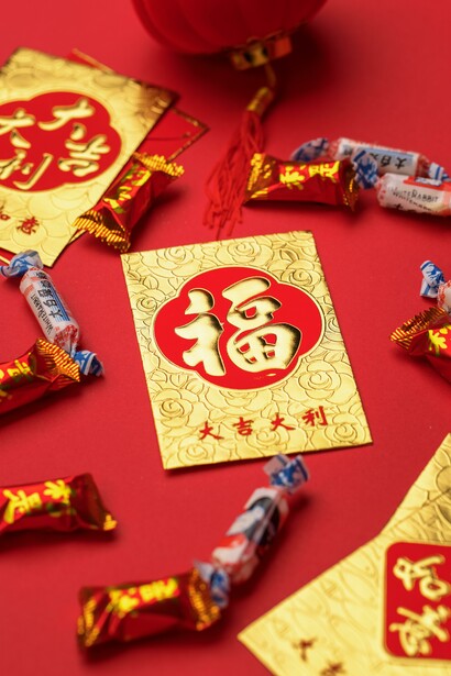 The color red represents fire, and for Chinese its push away bad fortune and scare away evil spirits