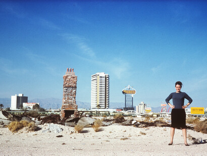 Denise Scott Brown, Denise in the Las Vegas Desert with the Strip behind her, 1966, courtesy Archives of Robert Venturi and Denise Scott Brown