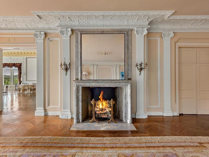 The main living spaces are designed for grand entertaining, featuring high ceilings and luxurious materials. Photo by © Tricia McCormack