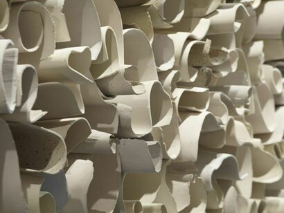 Carol Young (b. 1952). Memoria (Memory), 2013. Ceramic installation of 130 elements. Courtesy of the artist.