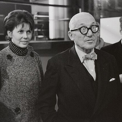 At Neumarkt in Zurich, Switzerland, Heidi Weber stands to the left of Le Corbusier