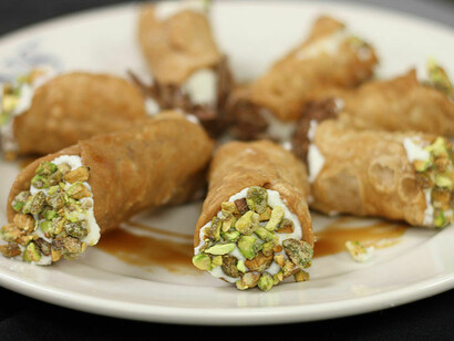 Cannoli, served family-style, as a sweet finale to the Feast of the Seven Fishes