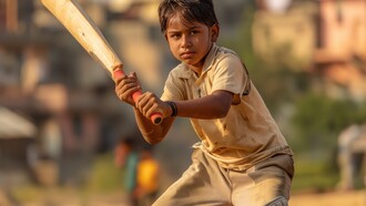An Indian boy practices his cricket skills with passion and precision