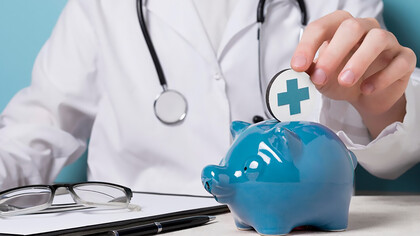 A doctor delicately holding a medical instrument while symbolically depositing money into a piggy bank, illustrating the juxtaposition of medical care and financial considerations in the healthcare industry