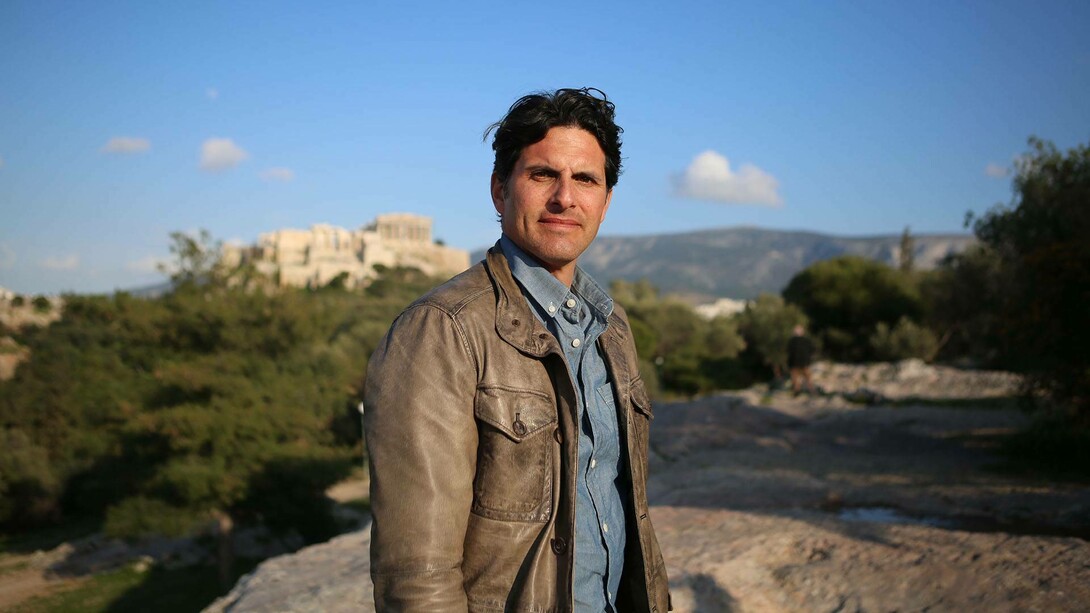 Classical archaeologist Darius Arya in a picturesque setting in Rome, Italy