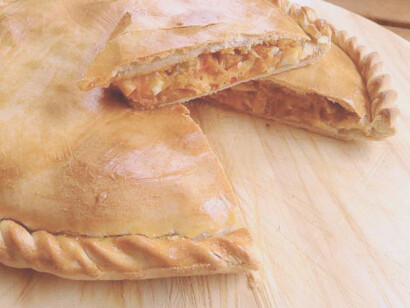 La empanada gallega, una de las más conocidas y buque insignia de su gastronomía