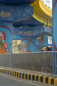 Pictures of Hindu saints from scriptures painted on intersection and the roadside pillars
