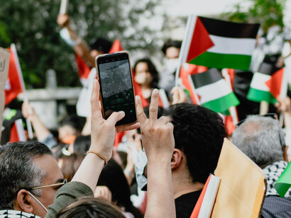 A pro-Palestinian demonstration with flags and banners