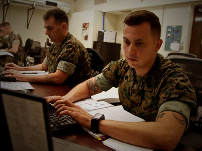 U.S. Marines enrolled in the Cyber Security Technician course at the Marine Corps Communications-Electronics School work on an assignment at Marine Corps Base Twentynine Palms, California, on March 15, 2017. The Communications-Electronics School trains Marines in ground electronics maintenance, tactical communications, and anti-air warfare operations for the Fleet Marine Force