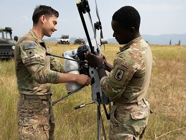 During Agile Spirit 25 at the Norio Training Area in Georgia, United States Army Spc. Tyler Dooros performs preflight checks on a PDW C100 drone ahead of a live operational demonstration on Aug. 2, 2025. A member of Hawkeye Platoon, Headquarters and Headquarters Troop, 1st Squadron, 91st Cavalry Regiment, 173rd Airborne Brigade, he prepares the aircraft to showcase aerial resupply and payload deployment missions using specialized 3D-printed attachments