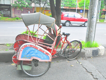The warm and welcoming atmosphere of the streets in Solo, Indonesia, invites visitors to linger, from the busy markets to quiet moments spent enjoying local temples