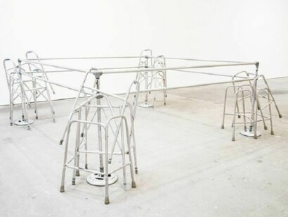 Cady Noland, Frame Device, 1989, Pipes, stanchions, 12 walkers. 132 x 132 x 54 in. (335.3 x 335.3 x 137.2 cm). Gaby and Wilhelm Schürmann, Herzogenrath, Germany; courtesy David Zwirner, New York. Courtesy of the artist and David Zwirner Gallery, New York.