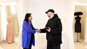 Georgian President Salome Zourabichvili awarding designer Demna Gvasalia, 2021