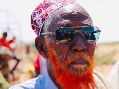 The face of this elder, lined with years of experience, carries the weight of Somali proverbs that continue to resonate deeply in everyday conversations, shaping both identity and moral guidance