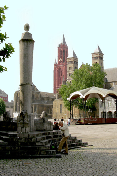 In the center of Maastricht lies Vrijthof, a grand square that has evolved from an ancient Roman and Frankish cemetery into a historic space once reserved for the Collegiate Church of Saint Servatius