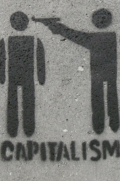 Grafitti anticapitalista realizado en la vía pública