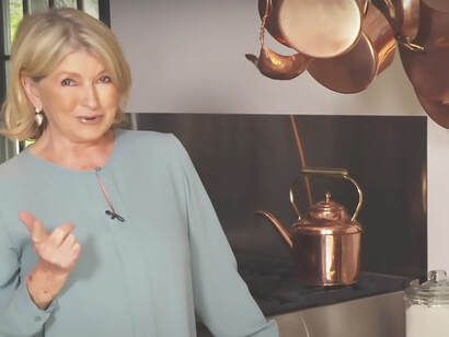 Martha Stewart in her impeccably styled kitchen, a showcase of both aesthetic sophistication and practical design