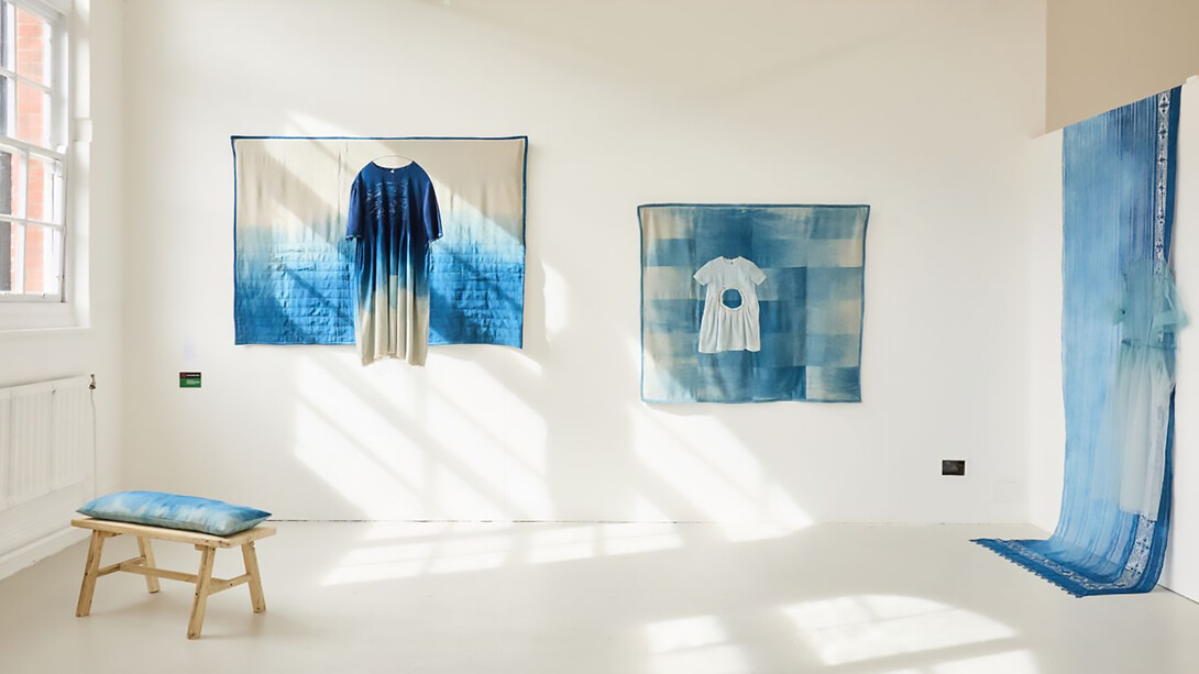 Sustainability Award for my final exhibition, photo by Denisa Ilie, featuring indigo-dyed, upcycled textile collections alongside Jade Guiraud’s guidebook Footprints in the Fells and Louise Keddy’s steel structures 