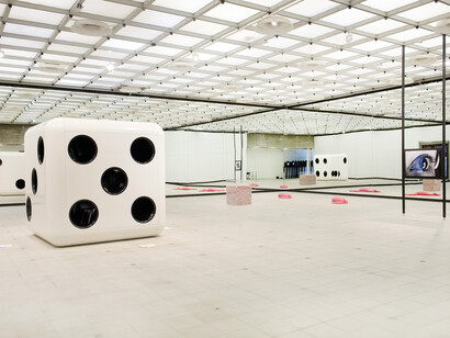 Carsten Höller, Dice (White Body, Black Dots), 2014; Half Mirror Room, 2008-2015, and Snake, 2014 © Carsten Höller. Installation view Carsten Höller- Decision, Hayward Gallery, London, 2015. Courtesy the artist. Photo © Linda Nylind
