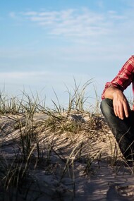 A man doubting his ability and going through the stages of imposter syndrome