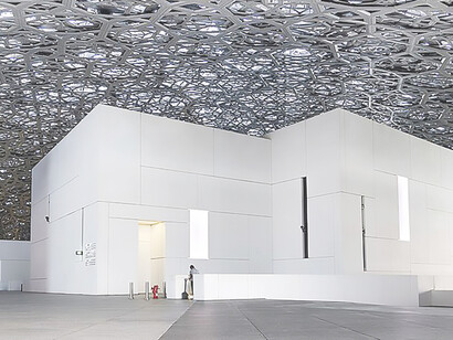 Step into the enchanting world inside Louvre Abu Dhabi, adorned with mesmerizing art by Giuseppe Penone, offering a cultural journey through captivating exhibits