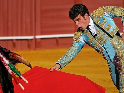 Juan Leal performing a pase de pecho during a bullfight in Seville, Spain, May 2013