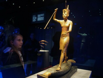 The golden figurine of Tutankhamun hunting found among the  royal treasures
