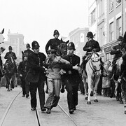 Eddie Worth, An anti-fascist demonstrator is taken away under arrest after a mounted baton charge during the Battle of Cable Street, London, 4, October 1936. Courtesy of the National Galleries of Scotland