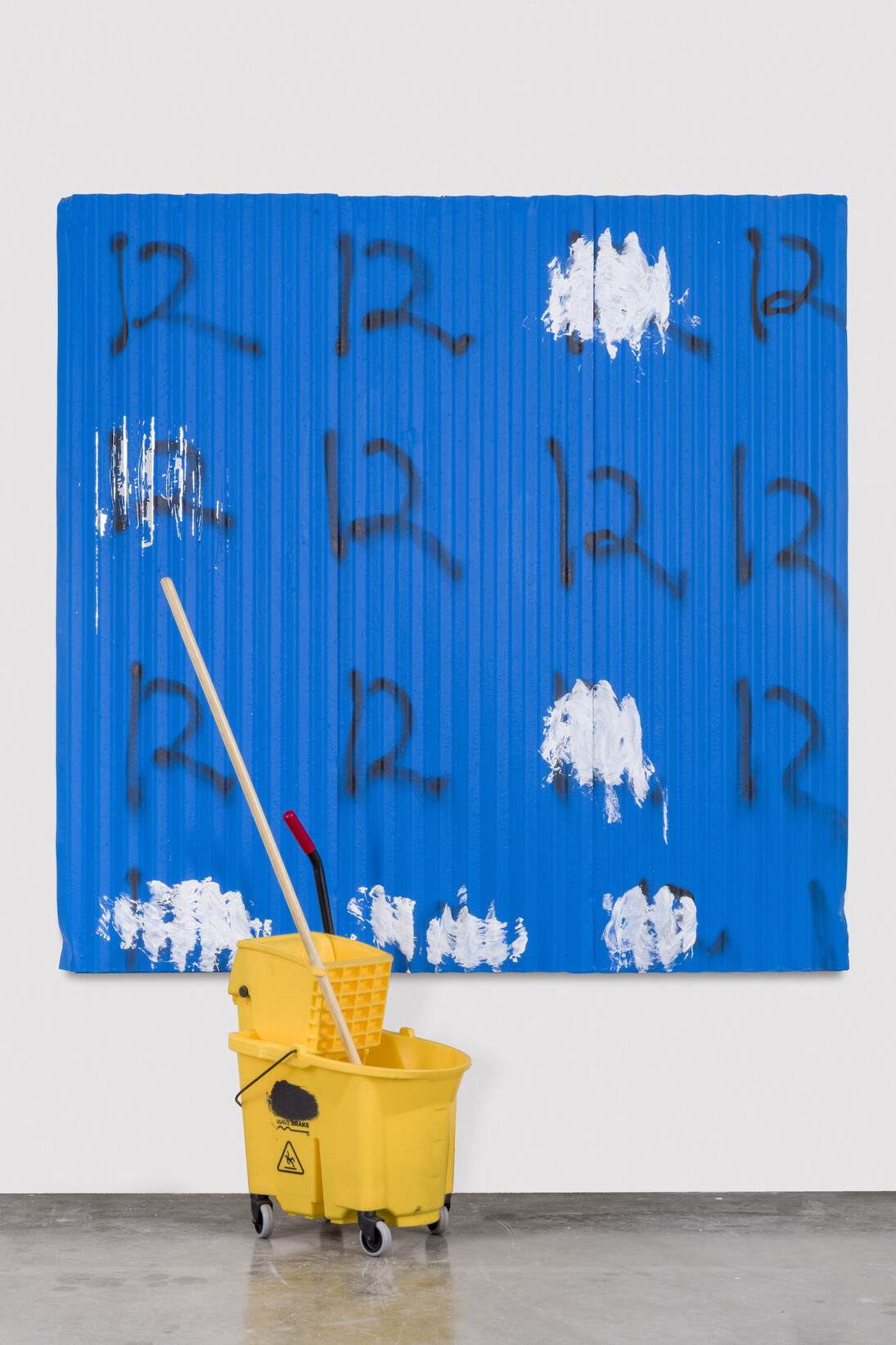 Awol Erizku, Wave Brake, 2017, Household paint and spray paint on corruated metal, with mop bucket 182.9 x 188 cm; (72 x 74 in.), Photo by Joshua White. Courtesy of Ben Brown Fine Arts