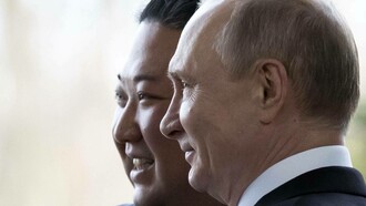 Russia's President Vladimir Putin posing for a photo-op with the Supreme Leader of North Korea Kim Jong-Un