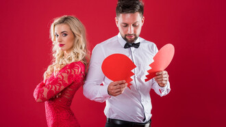 A man and woman facing away, the broken heart highlighting how fear of judgment complicates modern relationships