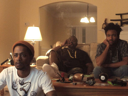 The three main characters of the the show chilling at Paper Boi's house