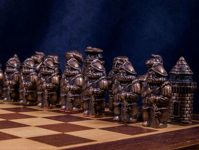 A disciplined line of pawns guarding the board, symbolising the ordinary structures that sustain powerful institutions