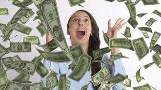 An image depicting a woman with a cascade of money showering down around her