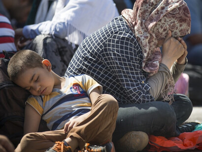 A mother and her child in a Syrian refugee camp