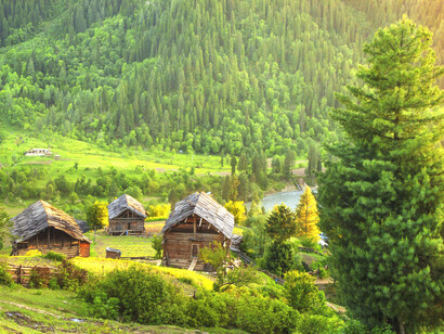 Rustic wooden huts in Neelam Valley, a picturesque region of Azad Kashmir