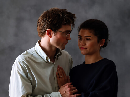 The Drama is a dark romantic comedy-thriller directed by Kristoffer Borgli that follows a young couple, Emma (Zendaya) and Charlie (Robert Pattinson), whose seemingly stable relationship descends into emotional turmoil one week before their wedding after a shocking confession about their pasts