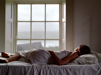 Danielle Nelson-Mourning, Untitled (Self Portrait on Bed), Maghery, Ireland, 2006. Archival ink jet print. Courtesy Weston Gallery, Carmel, CA