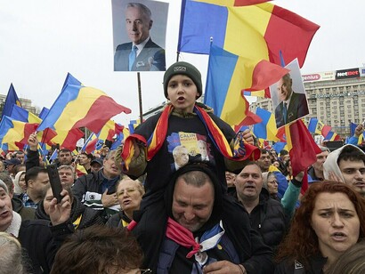 Nearly 2,000 followers of far-right politician Călin Georgescu convened in Constitution Square to celebrate his birthday, even though the former presidential candidate was not present Bucharest, Romania