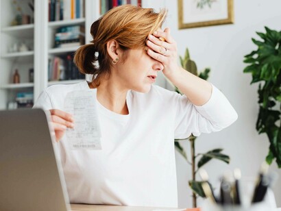 A woman stressed over her finances