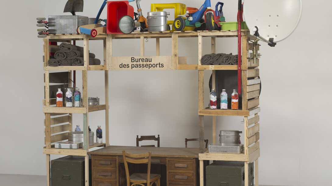 Antarctica World Passport Delivery Bureau, Palais Iéna Paris, 2012
Bureau construction in reclaimed materials, chair, desk, vintage military canteens, various objects, Antarctica World Passports, passport stamps, ink pads
220 x 60 x 240 cm variable
Courtesy of the artists. Photo: Bertrand Huet