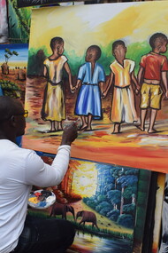 Canvas painting at the African Craft Village offers a vibrant display of local creativity