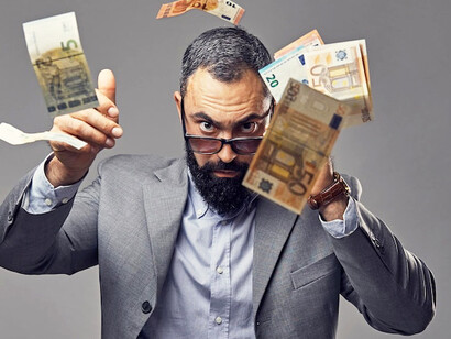 In a reckless display of power, the CEO throws cash, symbolising the detachment of the wealthy elite from the realities faced by those beneath them in a media-saturated world