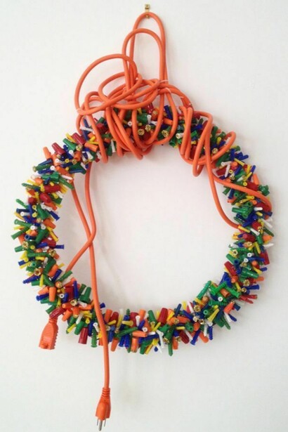 Shira Toren, Rainbow Wreath, 2013, wall anchors, wire caps, electrical cord