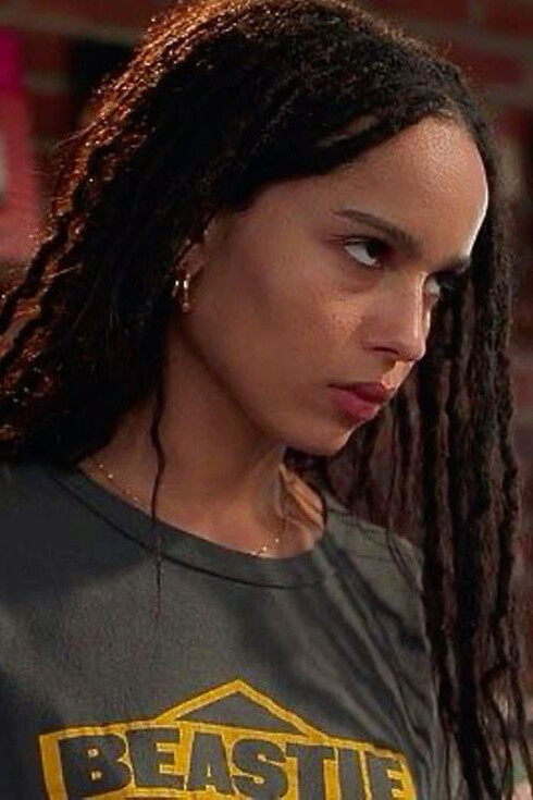 A woman with subdued anger written on her face 