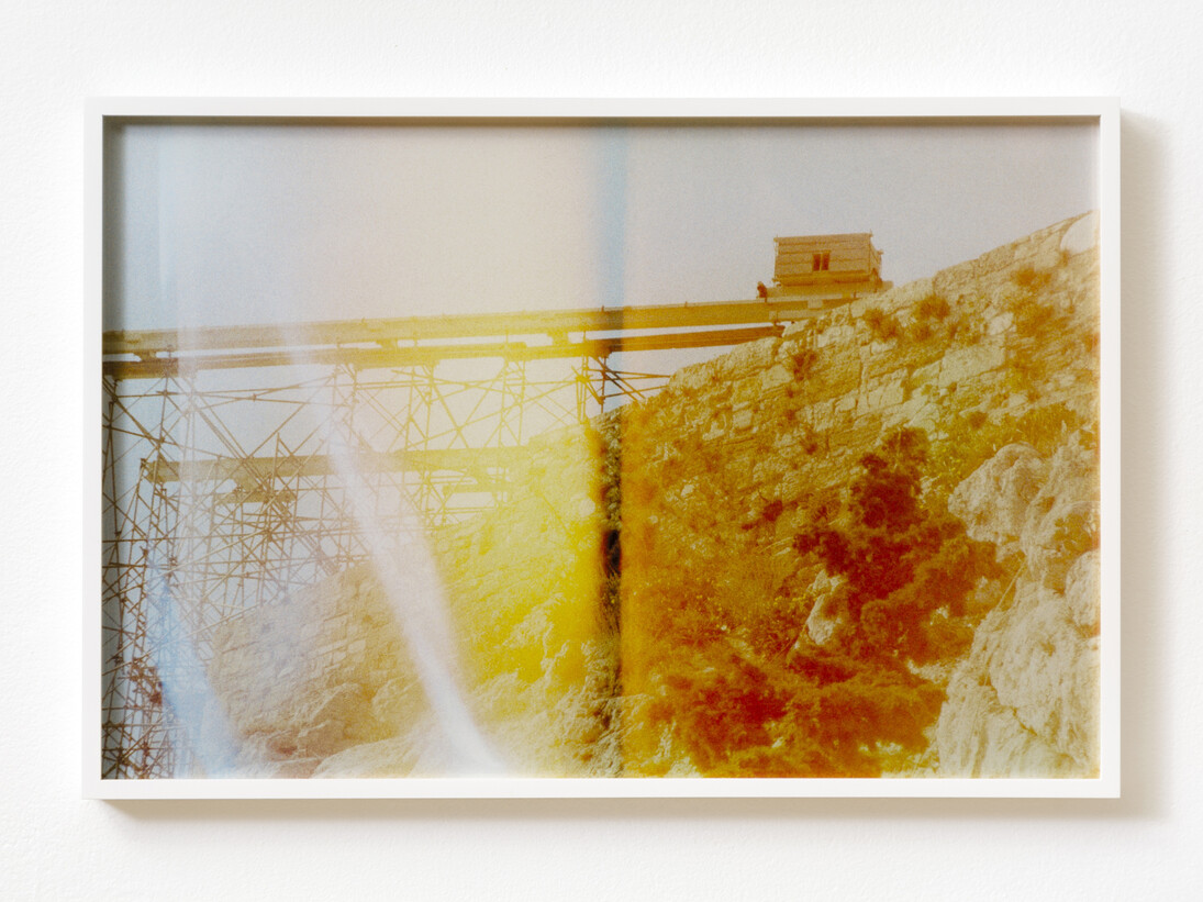Basim Magdy, The Hollow Desire to Populate Imaginary Cities, 2014. 30 C-Prints from chemically altered slides on metallic paper, 34 x 51 cm each. Installation view at Art in General. Image courtesy the artist and Art in General. Photo: Charles Benton.